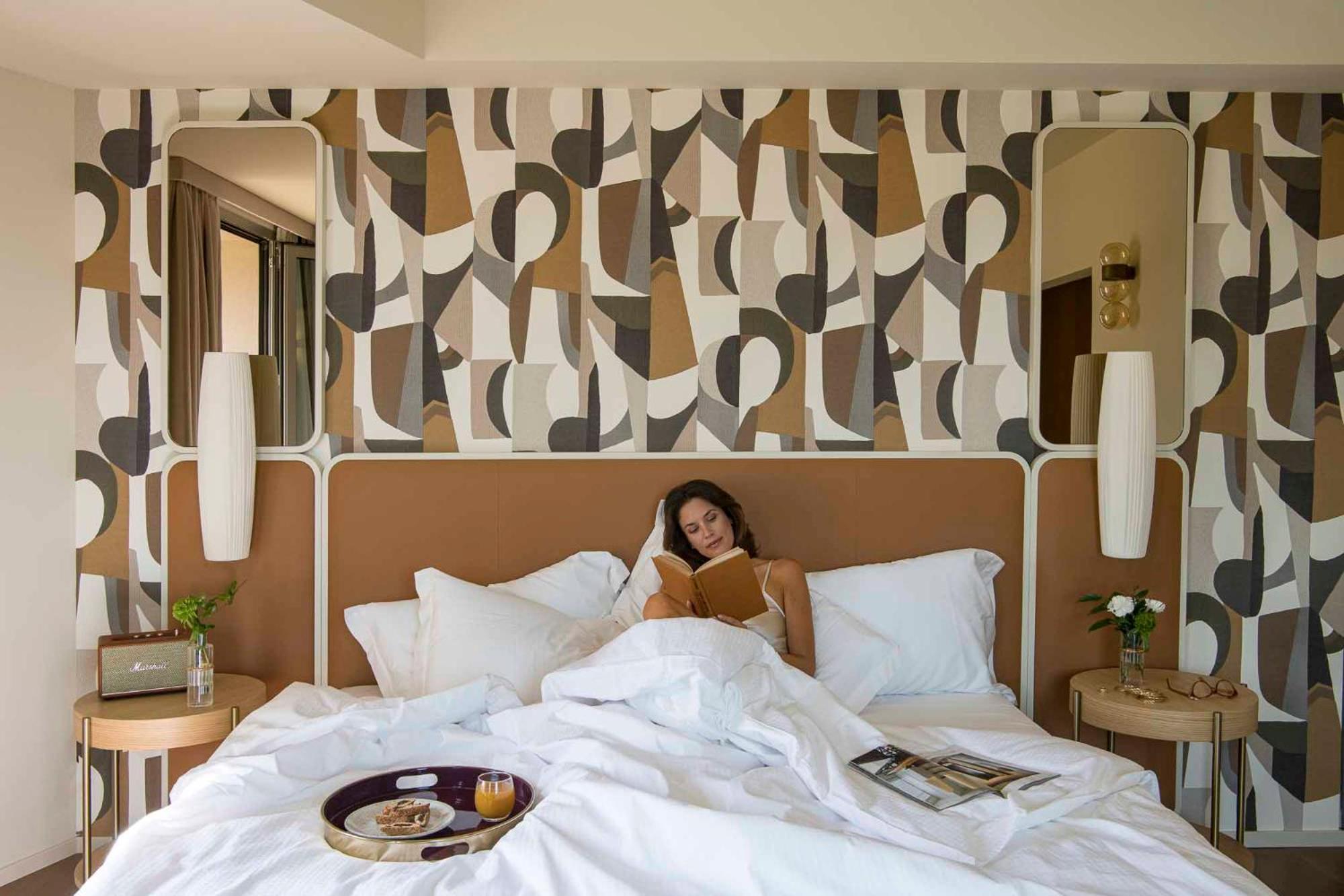 Columbus Urban Resort Florence Luaran gambar A guest in a bedroom at the hotel